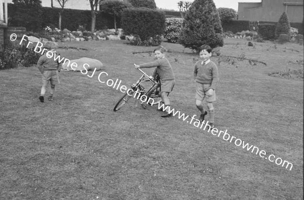 JOHN MALLICK PLAYING WITH HIS COUSINS O'NEILL & MRS O'NEILL AT MALLICKS ON CURRAGH